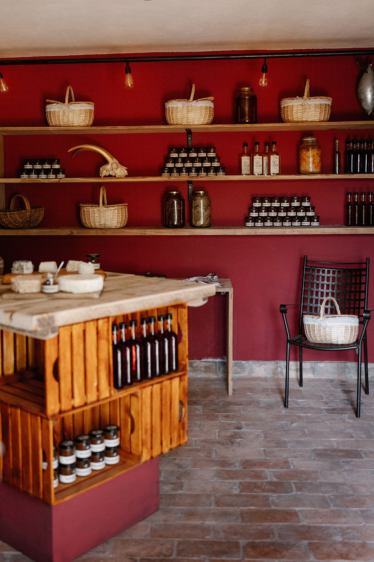 Kumparička farm shop counter with cheeses and preserves