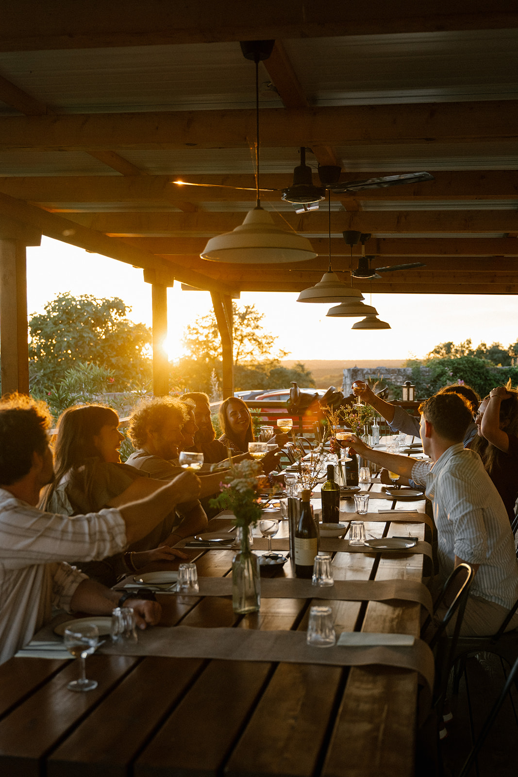 Long communal table at sunset at Kumparička